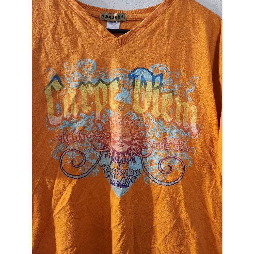 Caesars palace Carpe diem L orange top
